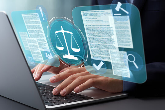 Document and compliance. Management and assessment system of compliance. Lawyer reviewing and preparing legal documents. Hands typing on laptop computer keyboard at desk in office.