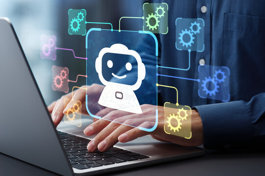 AI driven robotic process automation AIRPA. Artificial intelligence agent and intelligent automation IA technology. Businessman using laptop computer to give instructions to AI at desk in office.