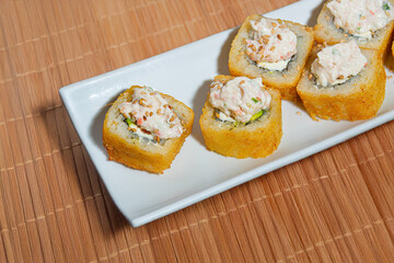 Close-Up of Tempura Shrimp Sushi with Chipotle Sauce