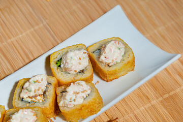 Close-Up of Tempura Shrimp Sushi with Chipotle Sauce