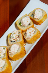 Close-Up of Tempura Shrimp Sushi with Chipotle Sauce