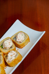 Close-Up of Tempura Shrimp Sushi with Chipotle Sauce
