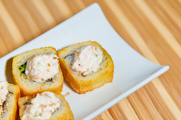 Close-Up of Tempura Shrimp Sushi with Chipotle Sauce