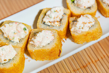 Close-Up of Tempura Shrimp Sushi with Chipotle Sauce
