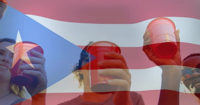 Holding red cups with Puerto Rican flag design at lively school event
