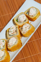 Close-Up of Tempura Shrimp Sushi with Chipotle Sauce