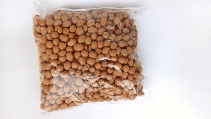 Indonesian traditional snack egg coated peanut (called kacang telur), It is made with peanuts mixed with egg batter and dusted with flour, plus a few seasoning ingredients, and then deep fried.