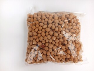 Indonesian traditional snack egg coated peanut (called kacang telur), It is made with peanuts mixed with egg batter and dusted with flour, plus a few seasoning ingredients, and then deep fried.