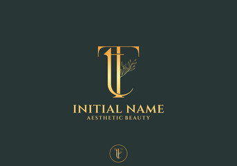 Letter Tt Beauty Logo with Flourish Ornament Luxury