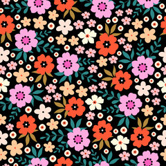 Seamless pattern with colorful flower blossom garden on black background. Cute hand drawn floral pattern for your fabric, summer background, wallpaper, textile.