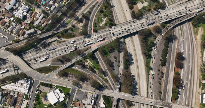 Busy road on multilevel highways, traffic on bridges and viaducts, Los Angeles California 