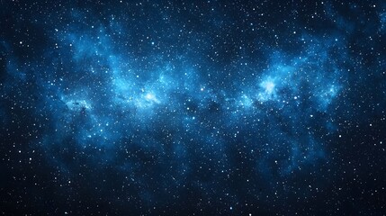 Enchanting blue nebula surrounded by sparkling stars and cosmic light in the depths of the mysterious universe
