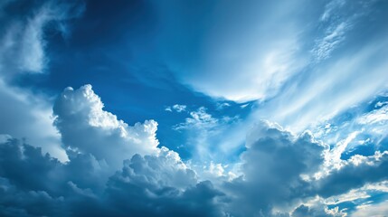 Dramatic Sky Overhead: Expansive Clouds Illuminated by Soft Sunlight, Capturing a Serene Yet Dynamic Atmosphere in a High-Resolution Landscape Photograph