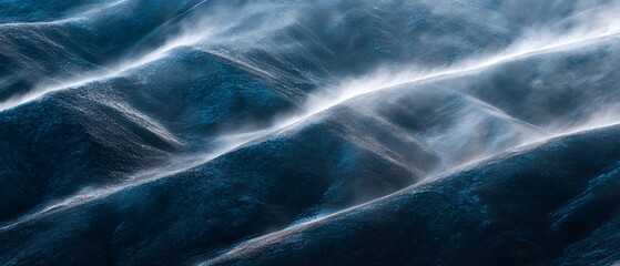 Aerial view of a desert landscape with wind swept sand dunes and gentle hills captured in a cinematic lighting style