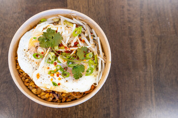 Bowl of Thai Noodle Food with Egg on Top