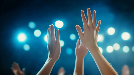 Celebration of joy concert audience raising hands live event indoor venue energetic atmosphere enthusiastic perspective