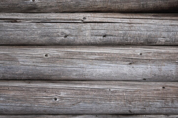 Naklejka premium The photo shows old logs in close-up