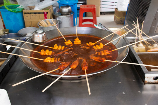 Local hawker stall traditional korean gourmet on street food bazaar market oden tteokbokki and Eomuk for travelers people travel visit and eat drinks at Nampo dong city in Busan or Pusan, South Korea