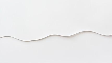 Obraz premium A white undulating curved line on plain white background
