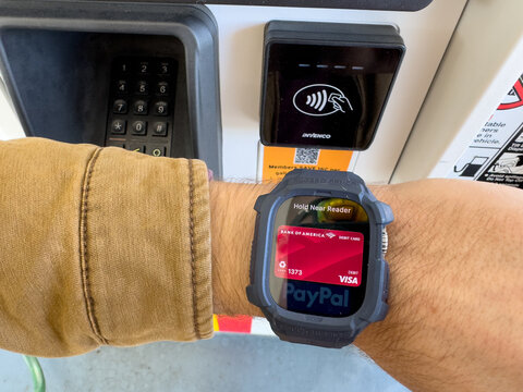 Tap to pay with Apple watch at gas station pump.