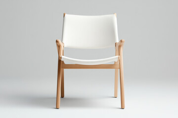 Modern white leather and wood lounge chair on plain background