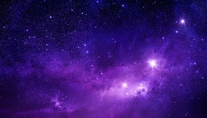 Obraz premium A stunning cosmic scene featuring a deep purple sky filled with bright stars and ethereal clouds of gas, evoking a sense of wonder and mystery in the universe.