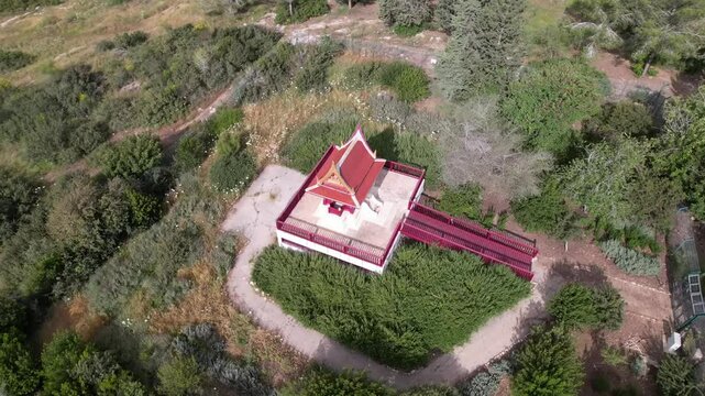 Aerial pullback view from Ben Shemen Forest reveal Traditional Thai Pavilion