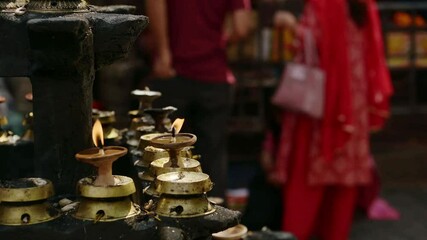 Candles and Hindu People Praying at a Religious Ceremony, Hindu Religion People in Prayer at a Hindu Religious Temple in Kathmandu in Nepal, Close Up of a Religious Festival and Praying Rituals