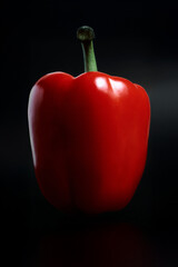 red pepper on black background