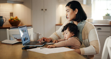 Multitasking, child and mom with laptop, remote work and editing article in kitchen with baby or...