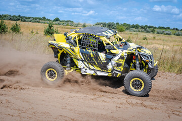 Cool view on UTV, rally, 4x4 riding in dusty track. Amateur competitions