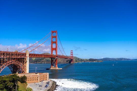 Golden Gate Bridge over blue waters with scenic hills in San Francisco