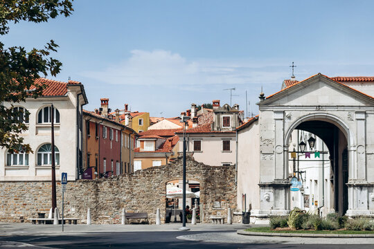 Koper, Slovenia - August 16, 2024: View of the historic center of Koper, featuring narrow streets, stone buildings, and Mediterranean charm