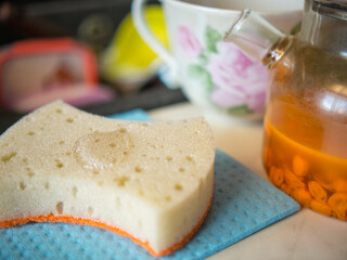 sponge and dishwashing liquid. clear detergent