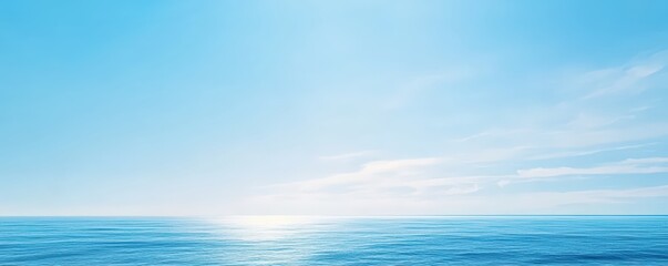 Obraz premium A serene seascape under a clear blue sky, where the calm ocean meets the horizon, reflecting sunlight and creating a peaceful atmosphere, Green Technology.