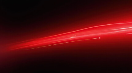 Fototapeta premium A red, fast-moving light line against a black background, evoking the feeling of speed, digital technology, and rapid motion in a futuristic design.