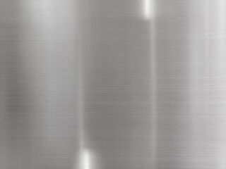 Motion blur stainless steel texture. Abstract gray polished metal background and white reflection