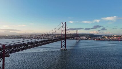 Aerial footage of Lisbon’s 25 April Bridge over Tagus River