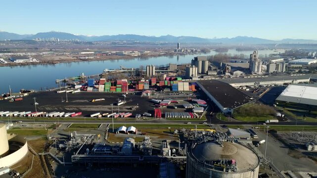 Aerial View Of FortisBC Tilbury LNG Plant And Fraser River In Tilbury Island, Delta, BC, Canada. - pullback shot