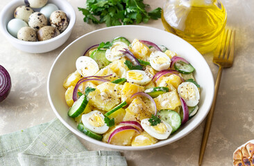 Salad with potatoes, cucumber, onion and eggs. Healthy food. Vegetarian food.