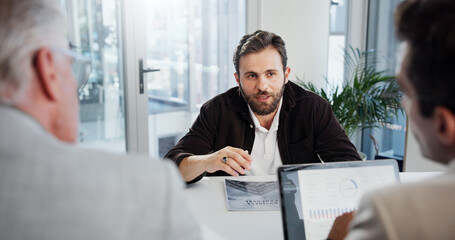 Fototapeta premium Collaboration, discussion and group with laptop, business and review of economic trends on website. Teamwork, colleagues and planning for investment in company, financial analyst and screen for stats
