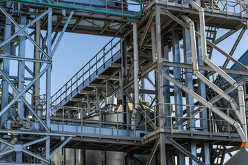 Metal structures, construction and manufacturing. Construction of an elevator, production facilities, and a factory. Production structures of the plant in the field of agricultural processing