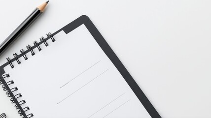 Top view of an open notebook with a pencil on a white desk, perfect for business or academic use.