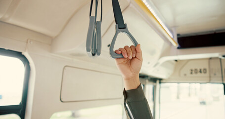 Hand, bus and travel with person, handle and public transportation with city service. Closeup, metro and passenger with routine, urban journey and morning commute with safety, trip and New York