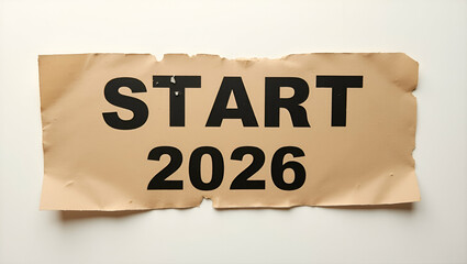 Start 2026: New Year Business Initiatives on Torn Brown Cardboard Paper