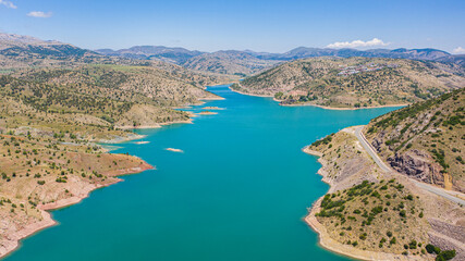 Aerial view of Pusat Dam lake in green valley Halfeti Sivas Turkey