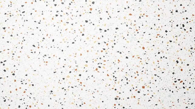 Terrazzo pattern background features a white surface with colorful chips, creating a visually appealing design
