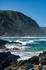 waves crashing on rocks