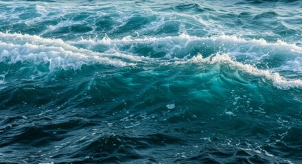 Beautiful turquoise ocean waves gracefully moving under the bright sunlight