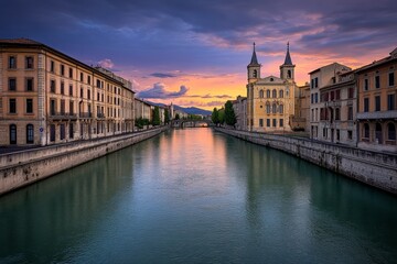 Fototapeta premium A dreamy watercolor sunset over Arles, blending soft pinks, blues, and oranges into the river and rooftops